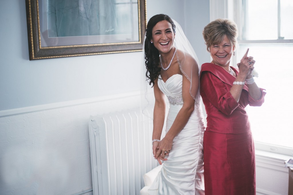 Bride and her Mom having fun  with Tom Studios Wedding Photography