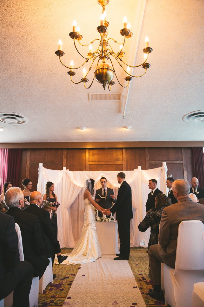 Bride and Groom at ceremony  with Tom Studios Wedding Photography 