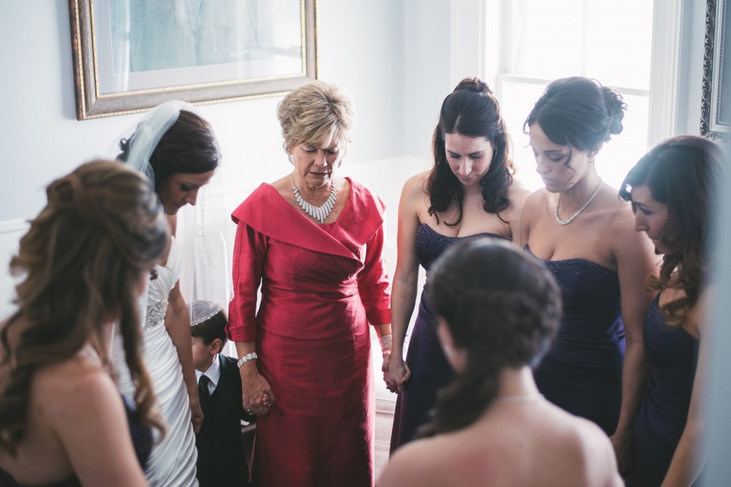 Praying before the ceremony  with Tom Studios Wedding Photography 