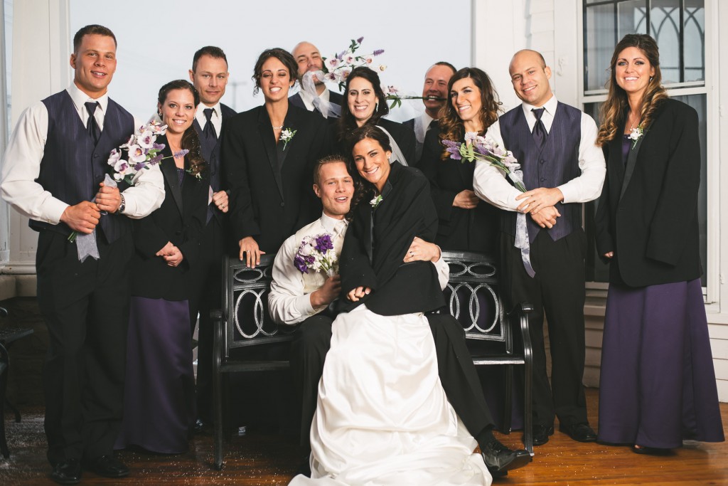 Bridesmaids with groomsmen's jackets with Tom Studios Wedding Photography 